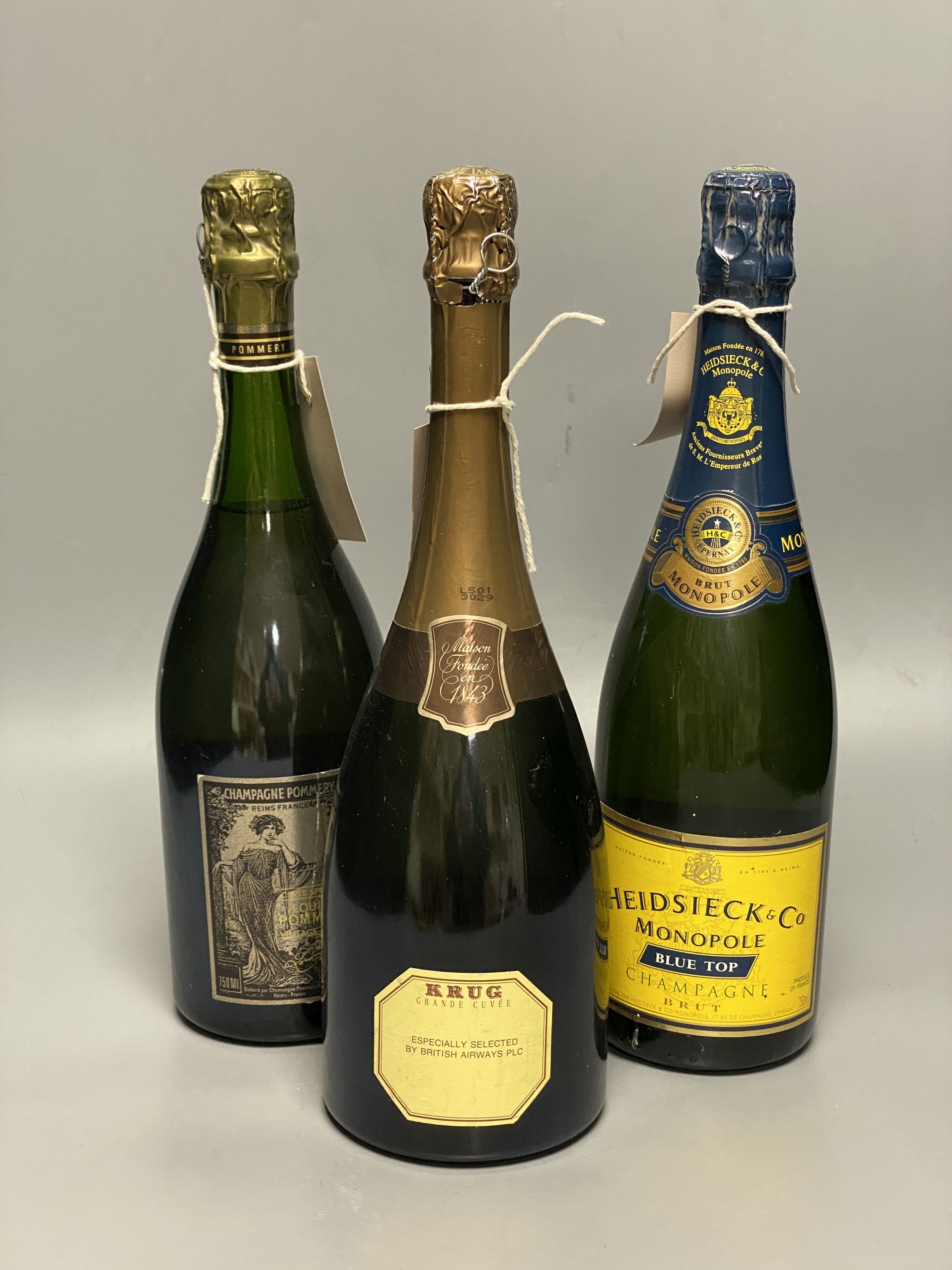 Three bottles of Champagne, including Krug Grande Cuvee,